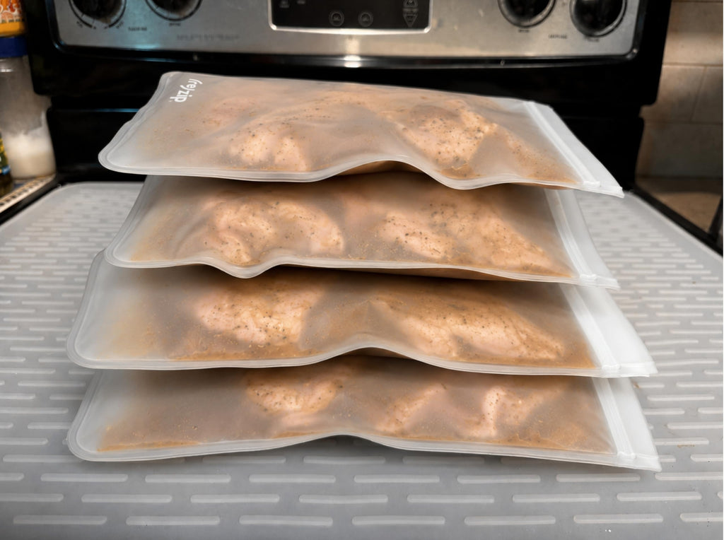 (re) zip Gallon Reusable Storage Bags, BPA-Free, Leakproof, Food-Grade 100% Food-Safe PEVA, for Food Storage and Freezer Use, Holds 16 cups | 128 fl oz, 4-Pack (Clear)