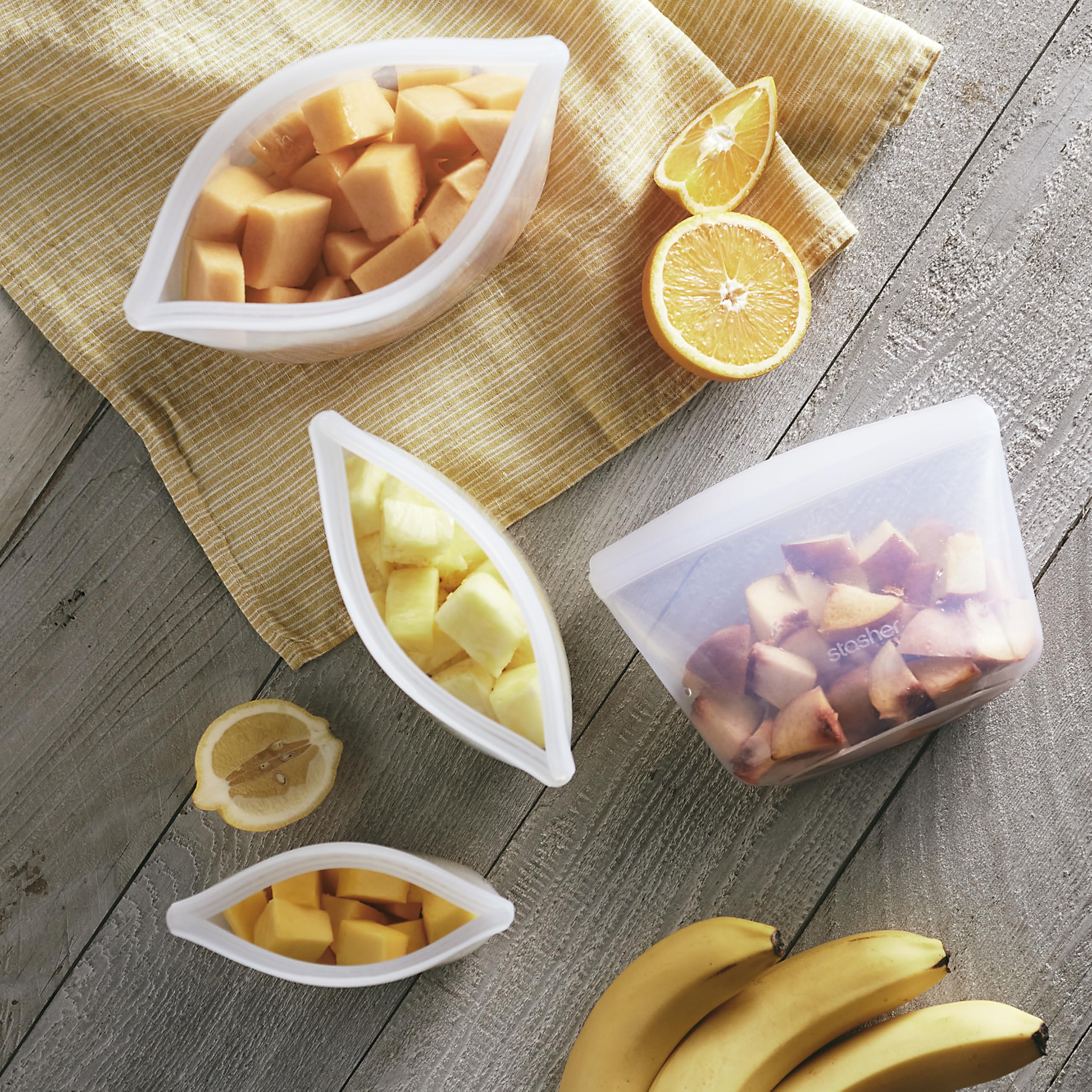 Stasher Silicone Reusable Food Storage Bags, 4-Pack, Reusable Freezer Bags, Microwave, Dishwasher, Oven Safe, Sous Vide, Premium Lunch Containers, Eco Friendly, Food-safe Silicone Snack Bag, Clear